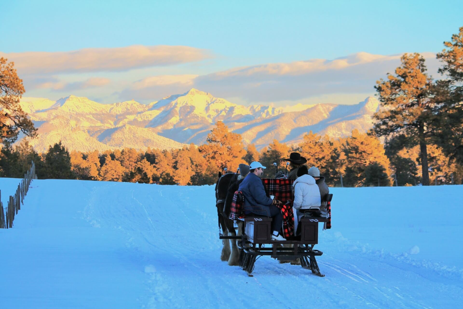 A sligh ride through with the majestic mountains in the background